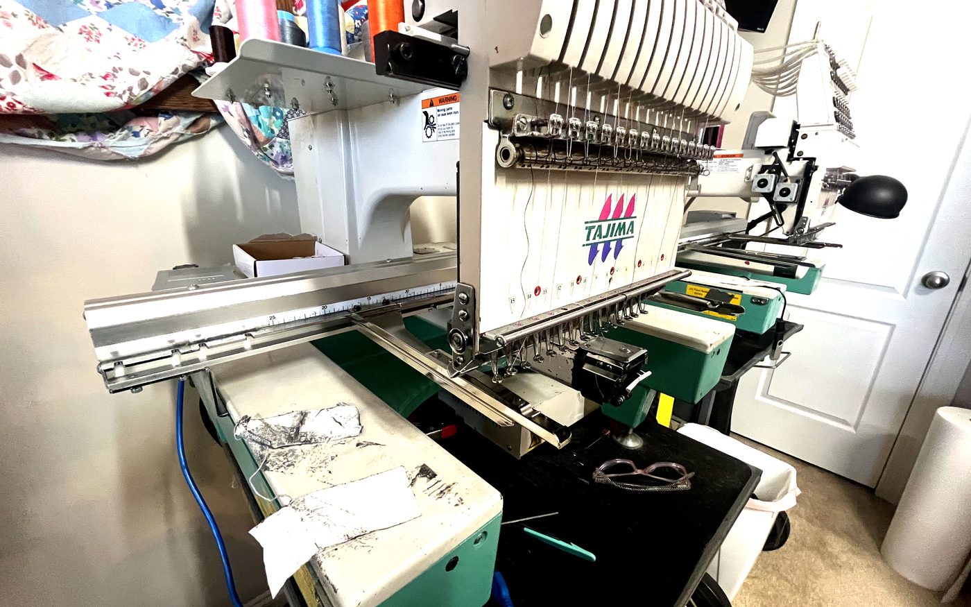 Full Tajima professional embroidery machine in studio